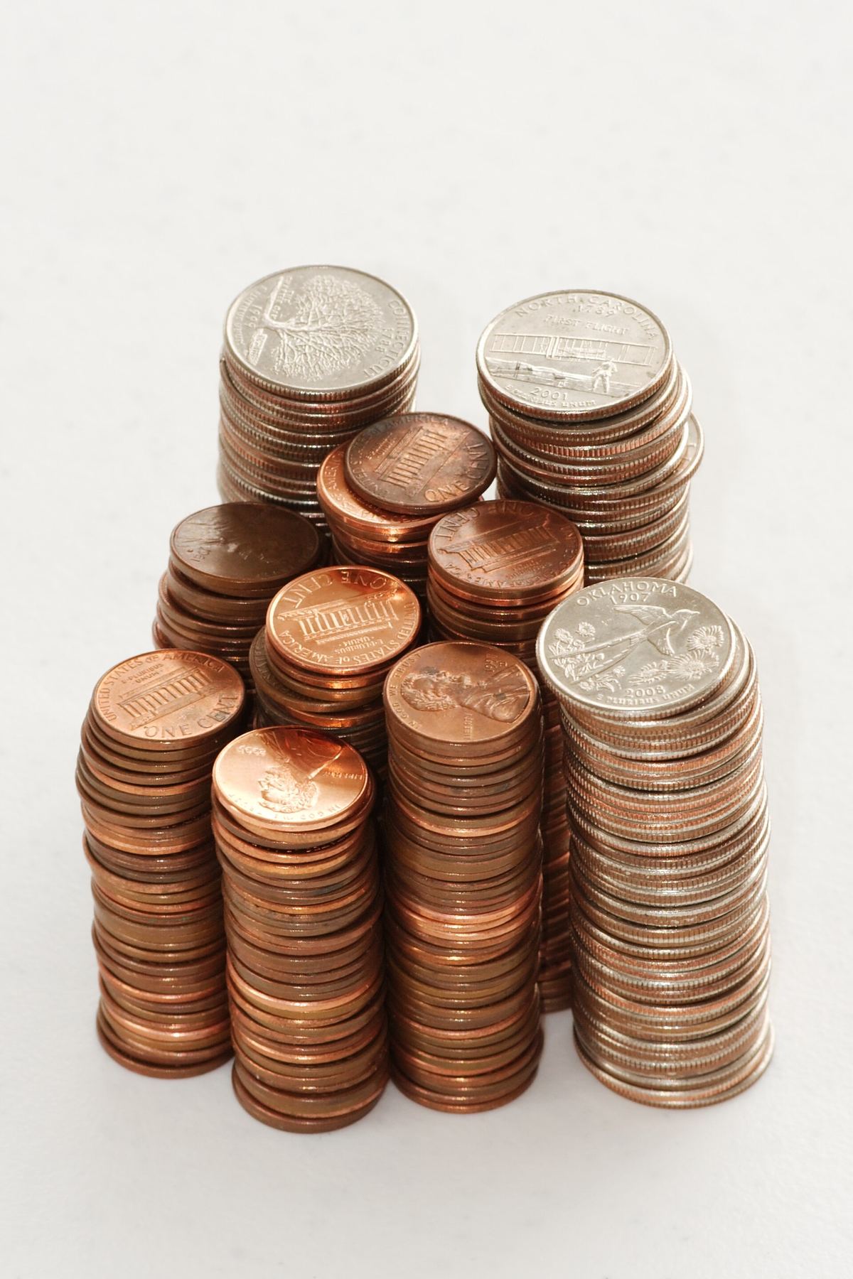 A small stack of coins representing a growing balance.