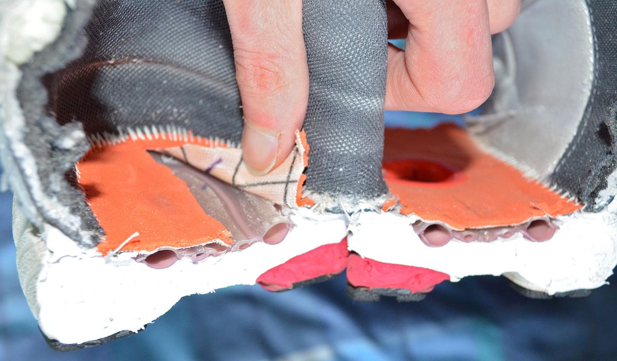 A close view of a running shoe showing the sole and upper.